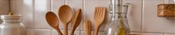 Wooden cooking utensils in a bright kitchen